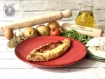 Traditional Greek Peinirli with Ham, Cheese and Bacon 